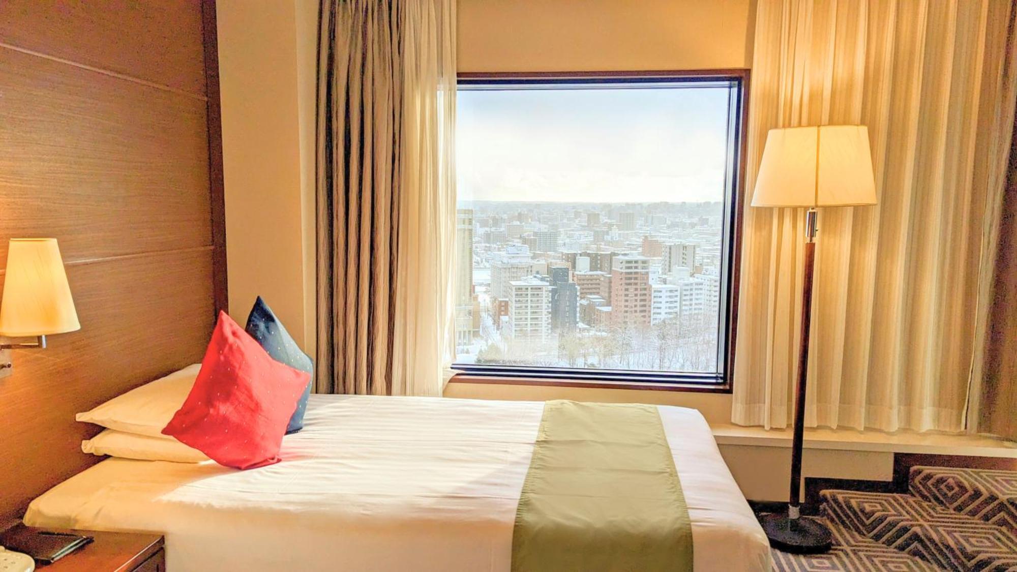 Premier Hotel Nakajima Park Sapporo Bagian luar foto A room at the hotel