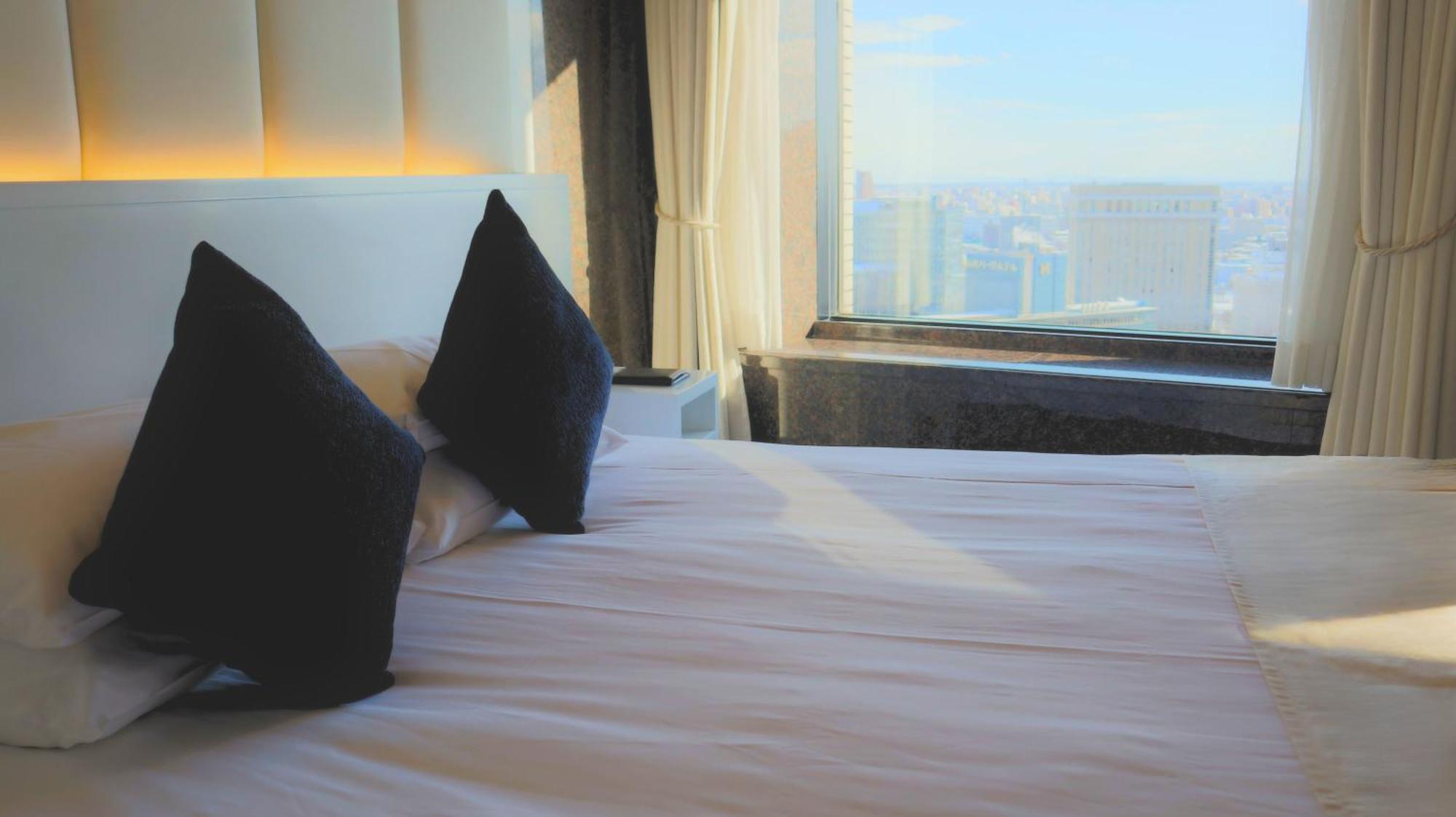 Premier Hotel Nakajima Park Sapporo Bagian luar foto A room at the hotel